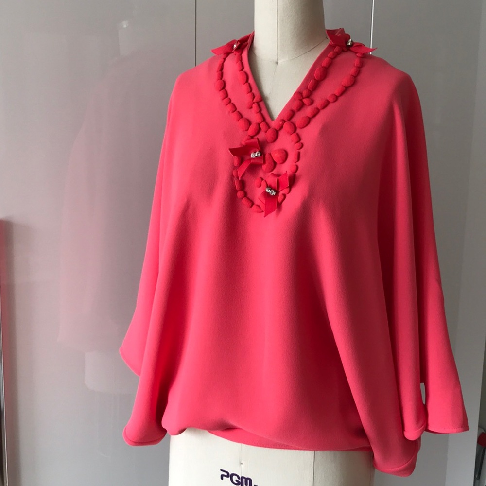 Tunic with wing style sleeves